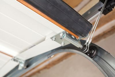 Make Sure the Door Lifts Evenly and Securely!